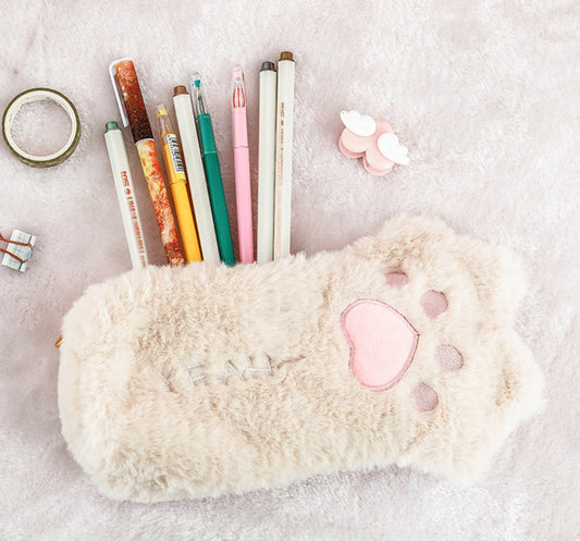 This super soft fluffy cat paw pencil case is just what you need to carry around all your stationery essentials