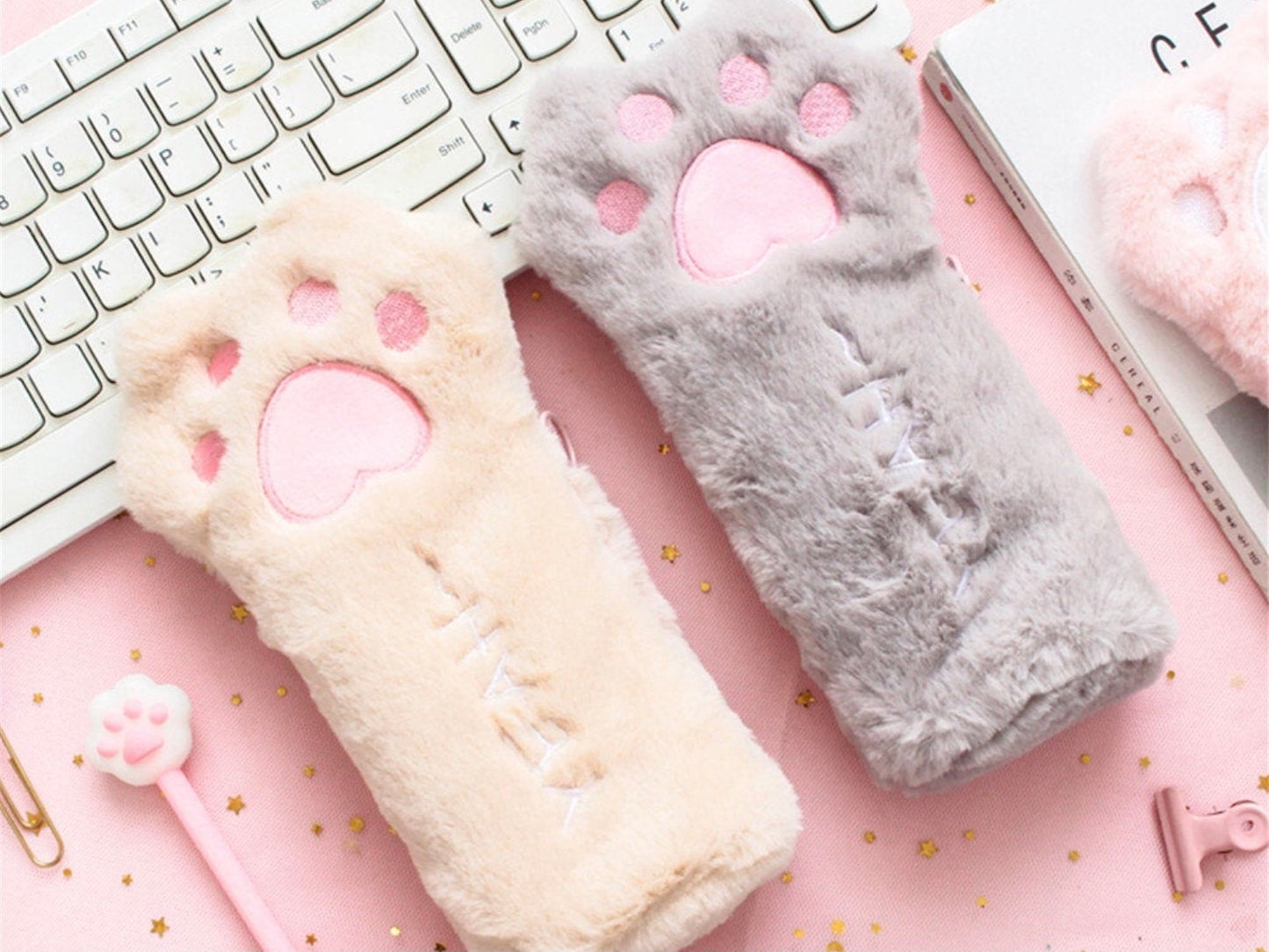 This super soft fluffy cat paw pencil case is just what you need to carry around all your stationery essentials