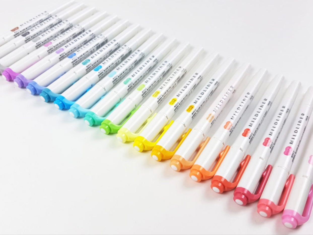 20 zebra mildliners lying in rainbow order on a white background