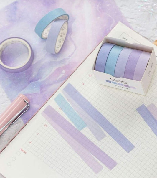 the hydrangea washi tape 5 pack next to samples of each of the 5 washi tapes on squared paper